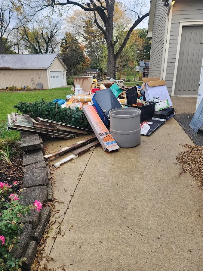 Dumpster being loaded with debris for 3 Yard Dumpster Rental in Lackawanna